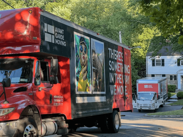 SoHo moving crew loading a truck on a cobblestone block